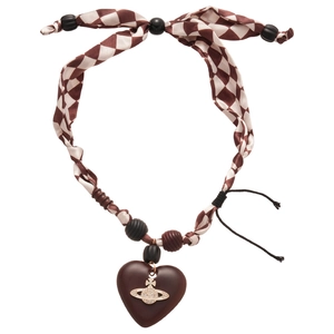 Vintage wood bead necklace with a large heart pendant and golden orb emblem
