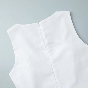 Detail of white square neck dress showing back invisible zipper and cotton fabric