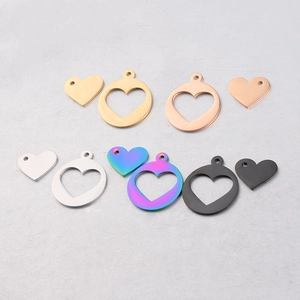 Detailed set of hollow and solid heart-shaped stainless steel pendants in five finishes