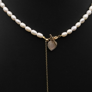 Elegant natural freshwater pearl necklace with gold heart pendant and OT toggle clasp