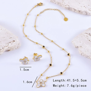 Detailed view of flower jewelry set dimensions with necklace and stud earring measurements