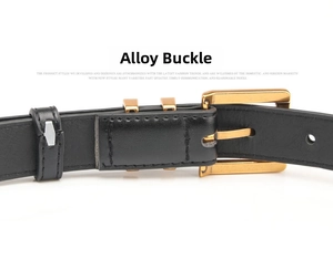 Detail of vintage black leather belt with gold alloy rectangular buckle and metal loops