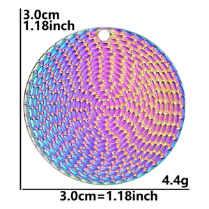 Macro view of a 3cm rainbow stainless steel pendant with scale texture and 4.4g weight