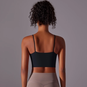 High-impact black sports bra with thin straps and open back for fitness training