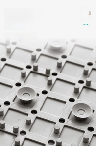 Detail of TPE bathroom mat showing bionic suction cups and anti-slip drainage holes