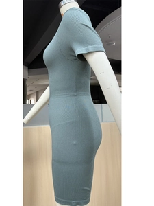 Seamless knitted yoga jumpsuit in dusty blue featuring a zipper and body-sculpting fit