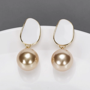 Boucles d'oreilles vintage en argent 925 avec perles et émail rose élégant