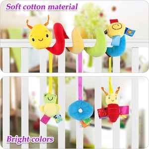Detail of colorful cotton caterpillar crib toy with soft plush animal hanging pendants