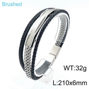 Detail of multi-layer braided leather bracelet with brushed stainless steel clasp