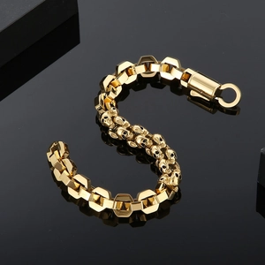 Golden stainless steel skull chain bracelet with polygonal links and mechanical clasp