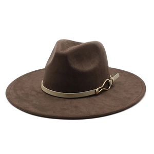 Dark brown suede wide brim fedora hat with a beige leather strap and gold metal buckle