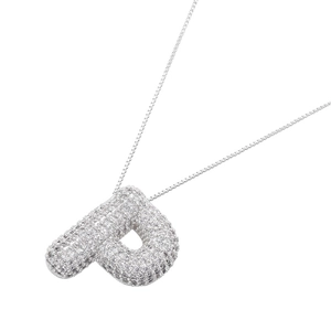 Close-up of silver-tone balloon letter P pendant with full pave cubic zirconia stones