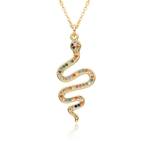 Detailed macro of gold plated snake pendant necklace with multi-color zircon stones