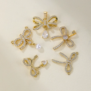 Golden bow jewelry charms with micro-pave zircons and pearls for DIY necklace making