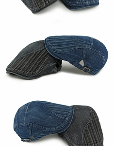 Détail d'une casquette plate en jean vintage avec empiècement rayé et boucle métal