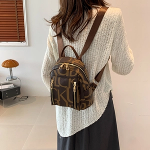 Vintage brown leather backpack for women with luxury letter pattern and dual straps