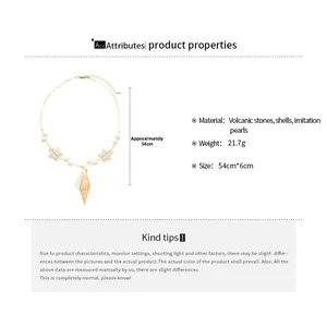 Detail of seashell pendant necklace with faux pearls and starfish charms on 54cm chain