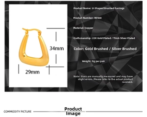 Macro detail of U-shaped brushed gold hoop earrings with specific size measurements