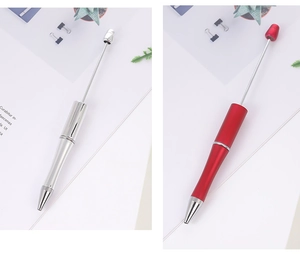 Detailed comparison of retractable metal beaded pens in silver and matte red colors