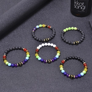 Detailed set of 5 chakra energy bracelets with lava stones and engraved mantra beads