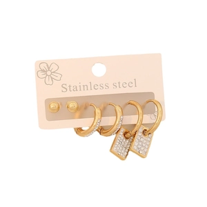 Three pairs of gold stainless steel earrings with heart and butterfly crystal accents