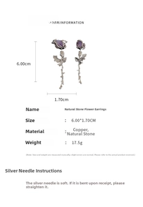 Detail of silver rose earrings featuring purple natural stone in a long floral design