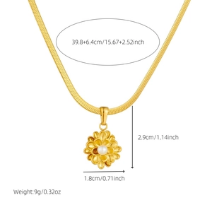Gold plated stainless steel necklace with lotus flower pendant and pearl accent on white background