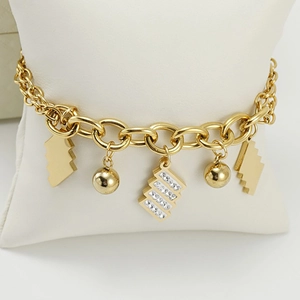 Bracciale a catena in acciaio inossidabile dorato con ciondoli geometrici e pavé di cristalli