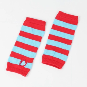 Detail of red and blue striped knitted arm warmers with thumb hole design