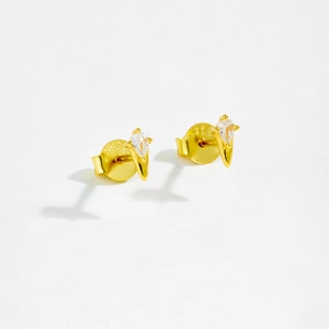 Close-up of golden S925 silver stud earrings with teardrop zirconia and S92 hallmark