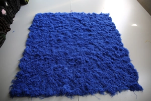 Detailed top view of high-density royal blue faux moss lawn for landscape decoration