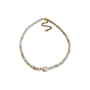 Beaded necklace with shell heart pendant and gold plating in bohemian style