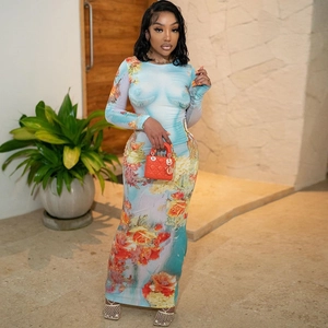 Close-up of long sleeve bodycon maxi dress featuring blue floral and abstract print