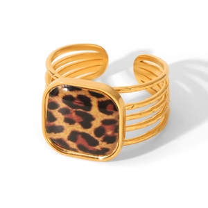 Detailed macro view of a gold-finish square ring featuring stylish leopard print texture