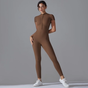 Front zipper detail on short-sleeve brown yoga jumpsuit for fitness and sports training