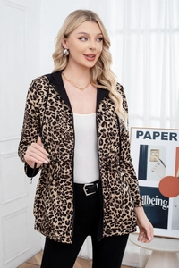 Detail of leopard print hoodie jacket featuring adjustable drawstring waist and zipper