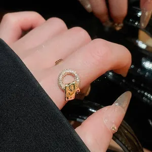Adjustable golden ring with sparkling zircon circle and geometric pendant for women