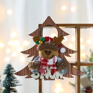 Detail of wooden reindeer hanging decoration with plush texture and SNOW lettering