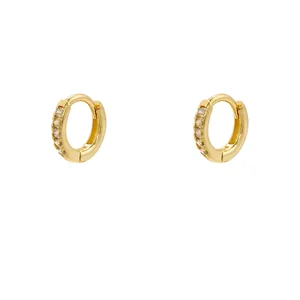 Golden brass hoop earrings featuring a single row of sparkling cubic zirconia stones