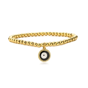Gold plated bead bracelet with central blue enamel evil eye pendant on white background