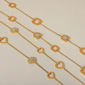Gold plated titanium steel sweater necklaces with hollow heart and square zircon pendants