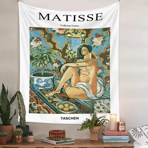 Detail showing the artistic Matisse hanging tapestry against a white textured wall