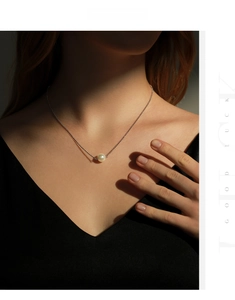 Elegant s925 silver necklace featuring a 10mm white pearl on a delicate bead chain