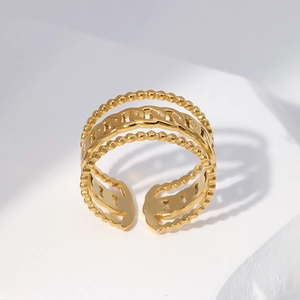 Minimalist triple-layer golden stainless steel open chain ring on geometric stone base