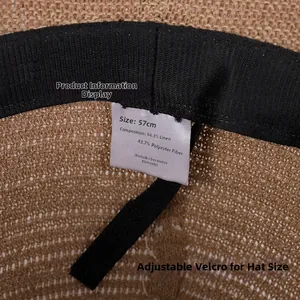 Detailed macro view of the linen bucket hat interior with size tag and velcro strap