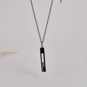 Minimalist black stainless steel necklace featuring a hollow rectangular pendant for unisex