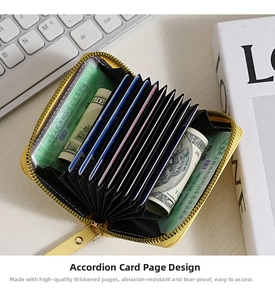 Internal accordion slots and zipper closure detail of yellow multi-card holder wallet