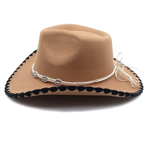 Detail of western wool fedora with evil eye beads and black whipstitch edge