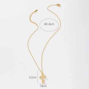Detail of gold cross pendant with white zircon showing dimensions 3.2cm x 40+6cm chain