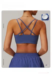 Brassière de yoga bleue à dos croisé avec coussinets amovibles et tissu respirant sport